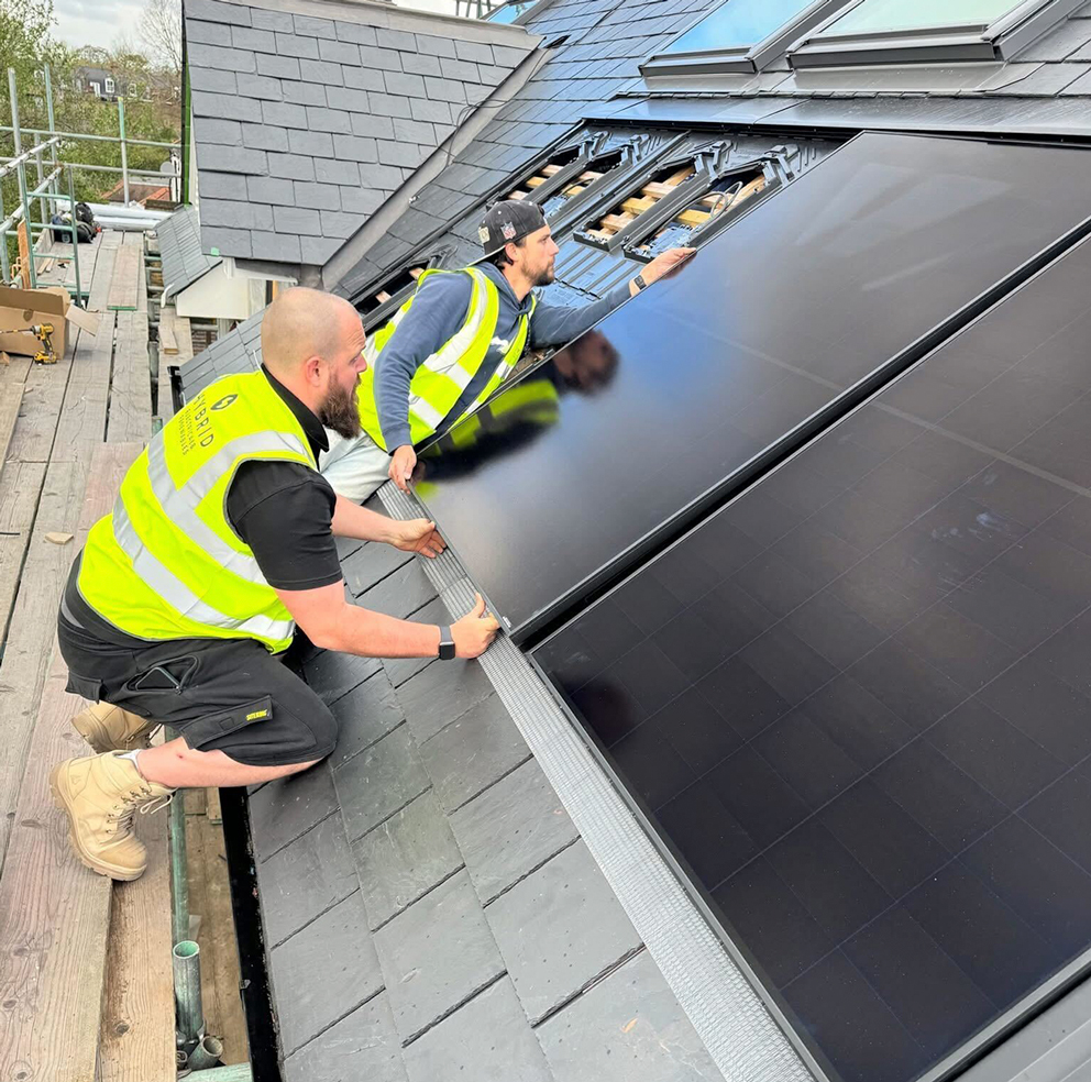 hybrid electrical & renewables installing solar panels and battery storage on a uk property
