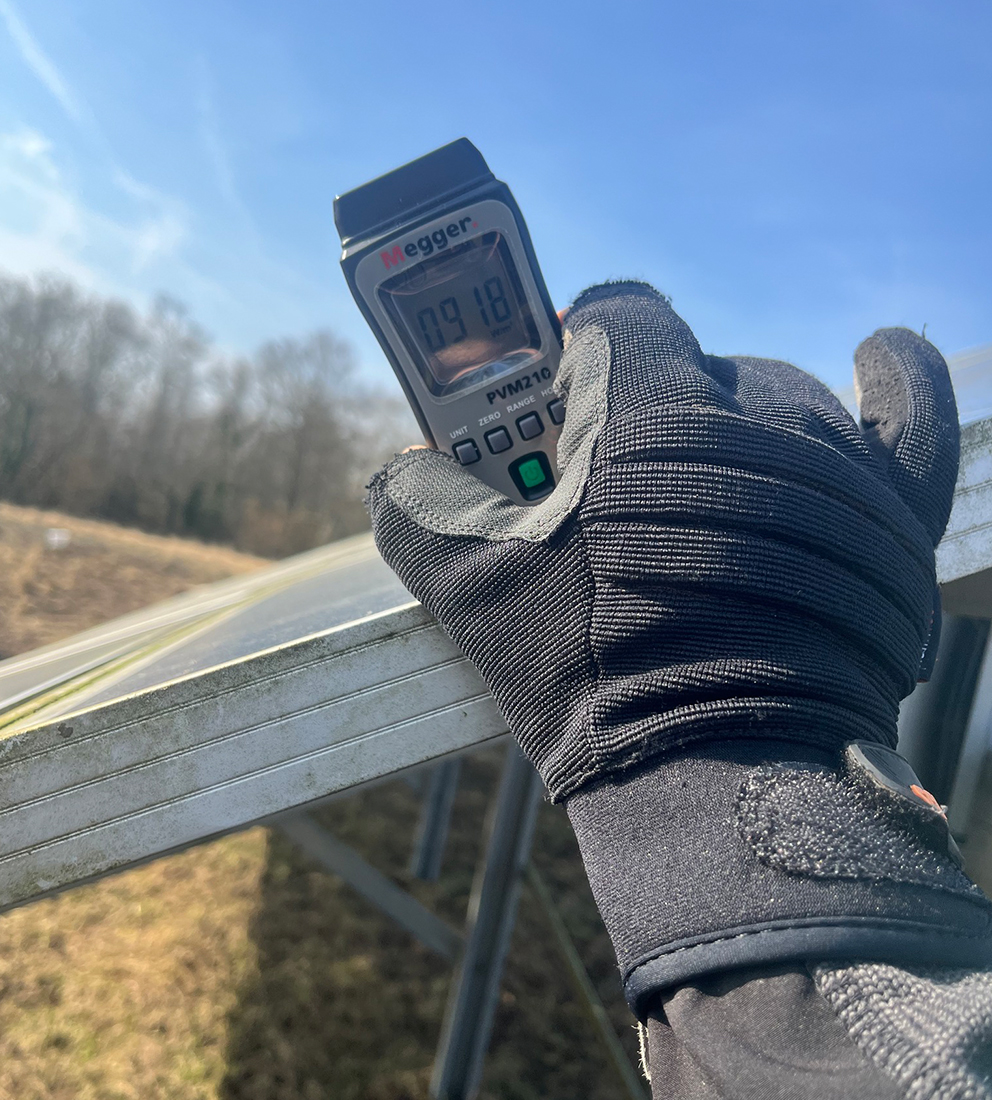 solar panel system inspected by hybrid electrical & renewables